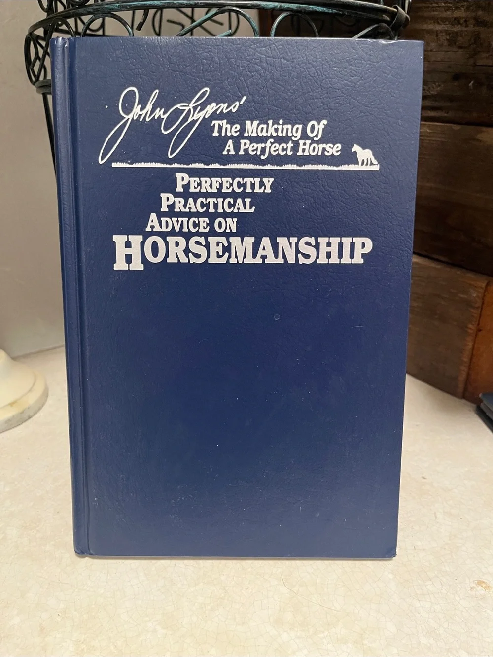 John Lyons Perfectly Practical Advice on Horsemanship - Blue Hardcover